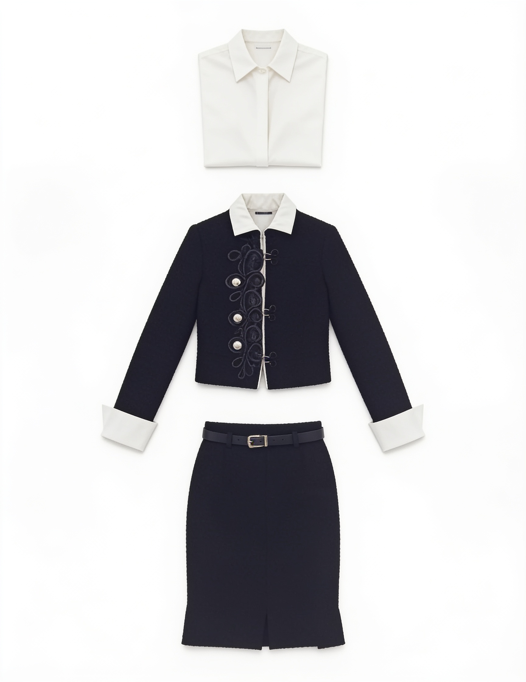 Black tailored skirt suit and white blouse