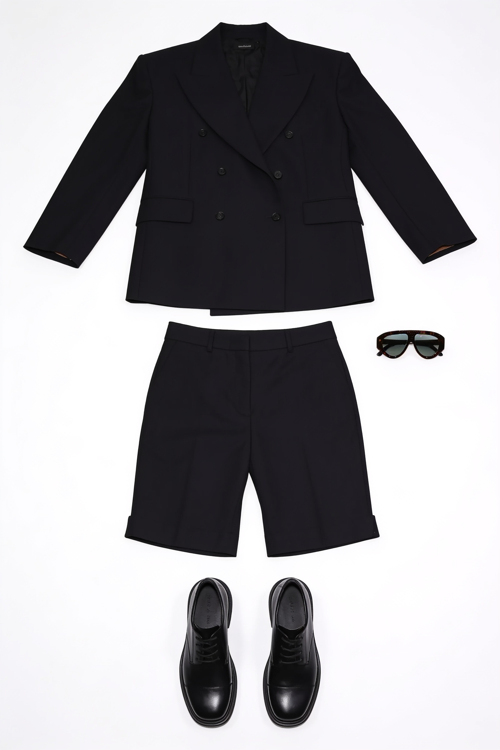 Black blazer and tailored cycling shorts
