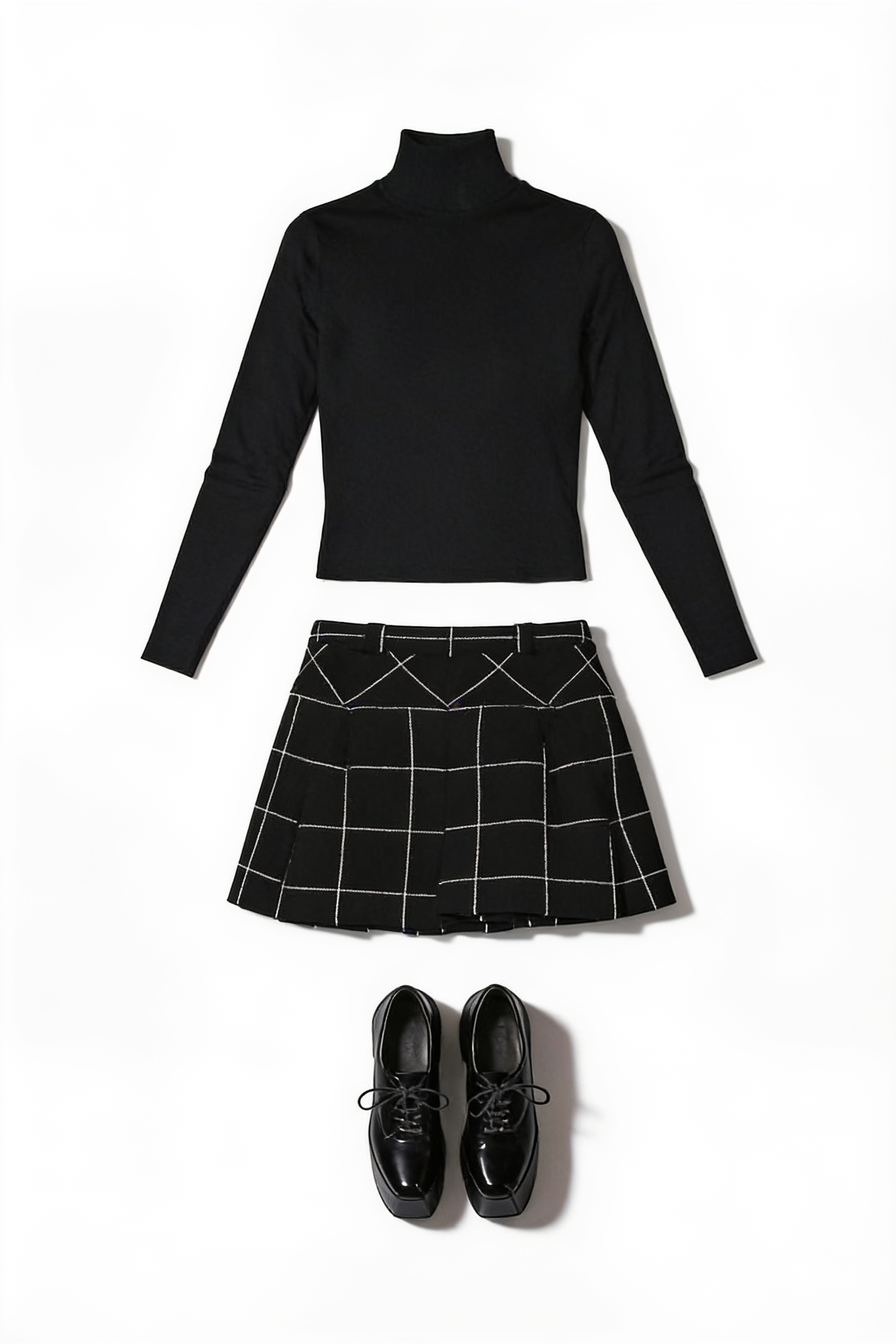 Black fitted sweater and checked mini skirt