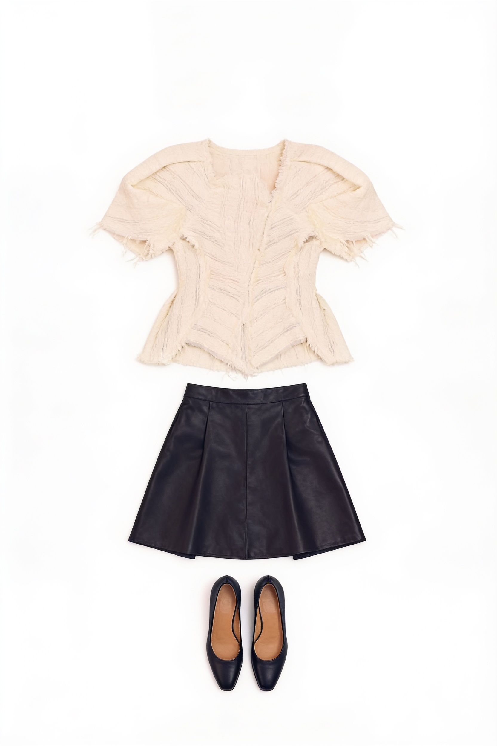 Cream textured blouse and black mini skirt