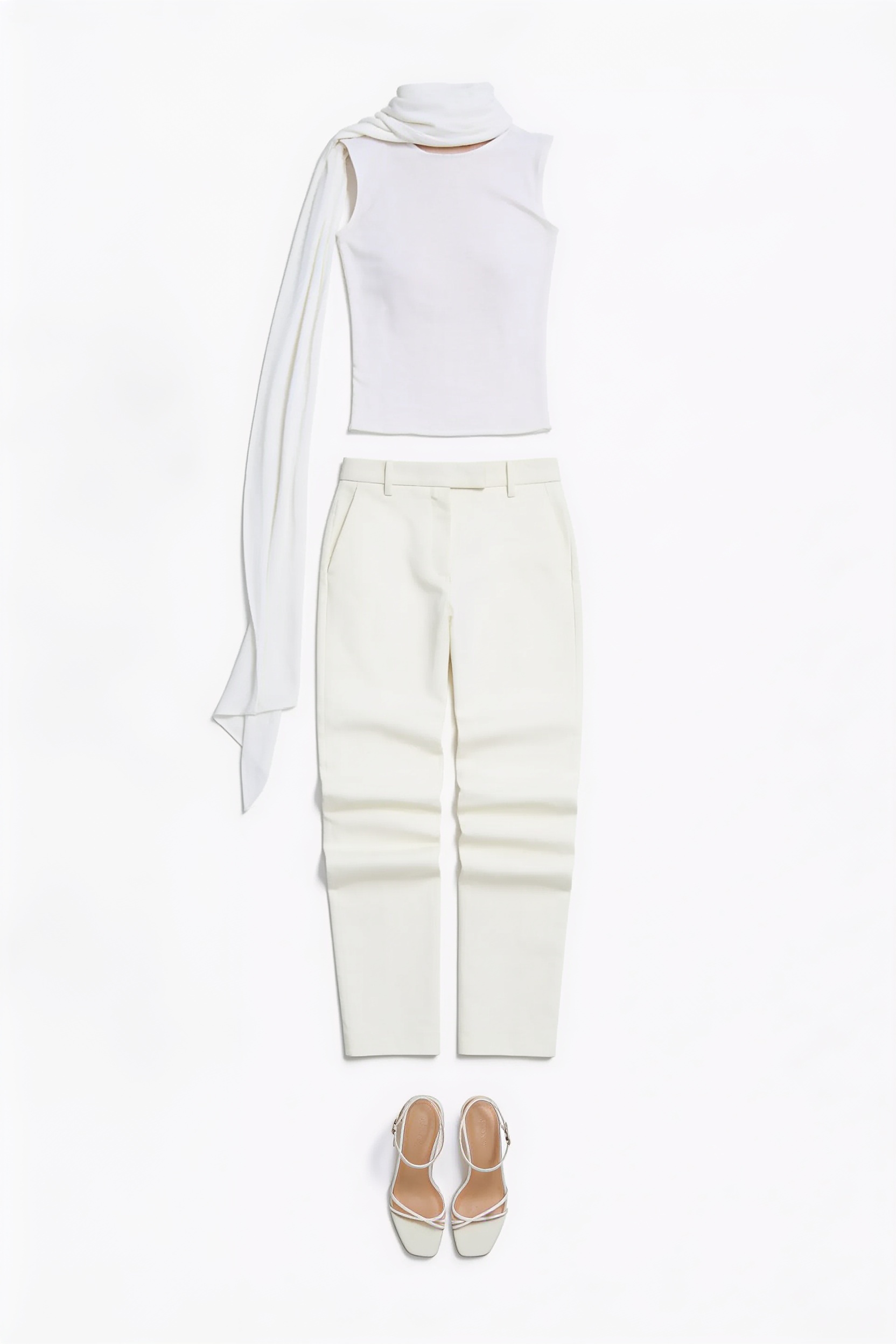 White sleeveless top and draped trousers