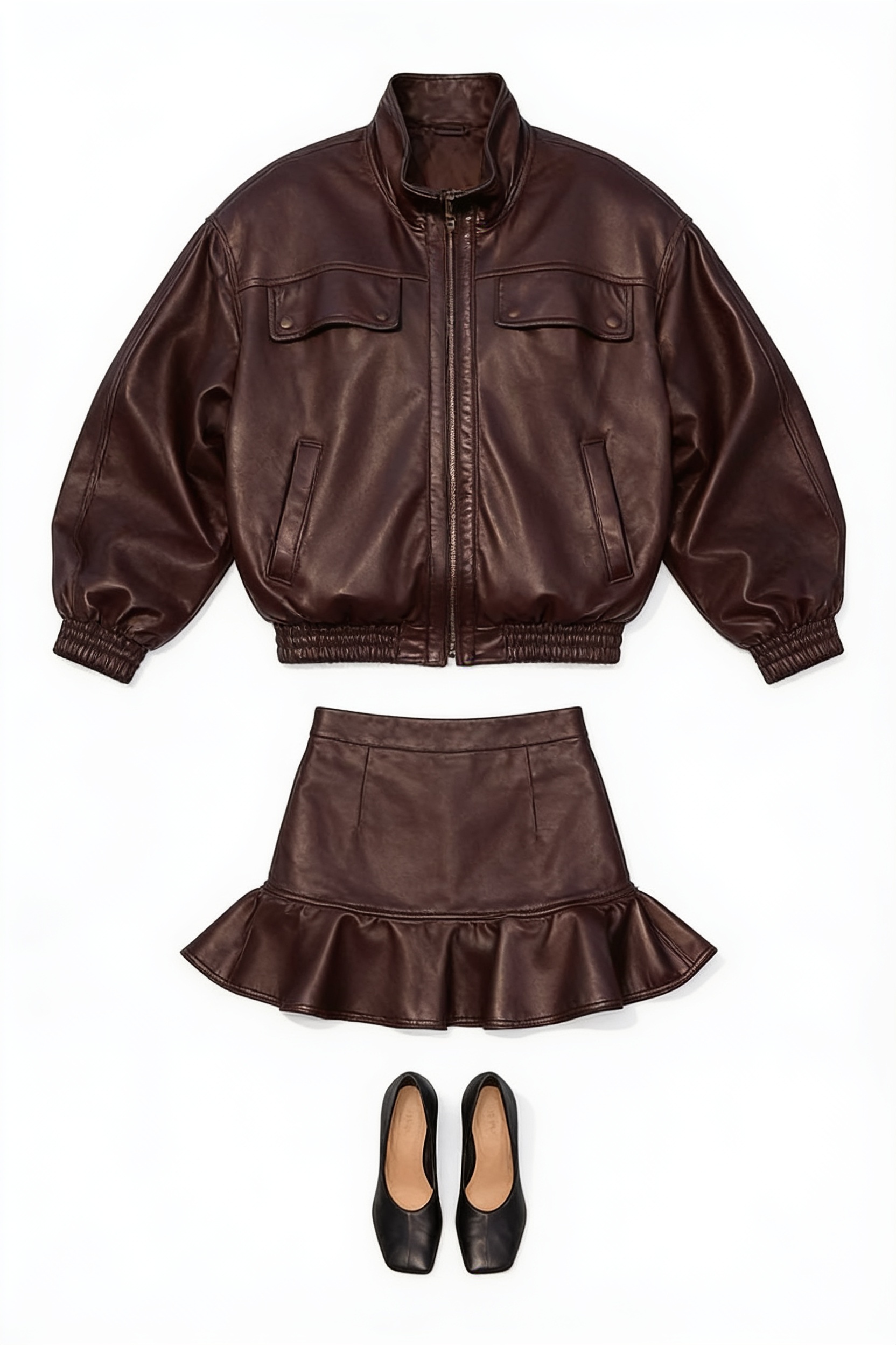Brown leather bomber and pleated mini skirt
