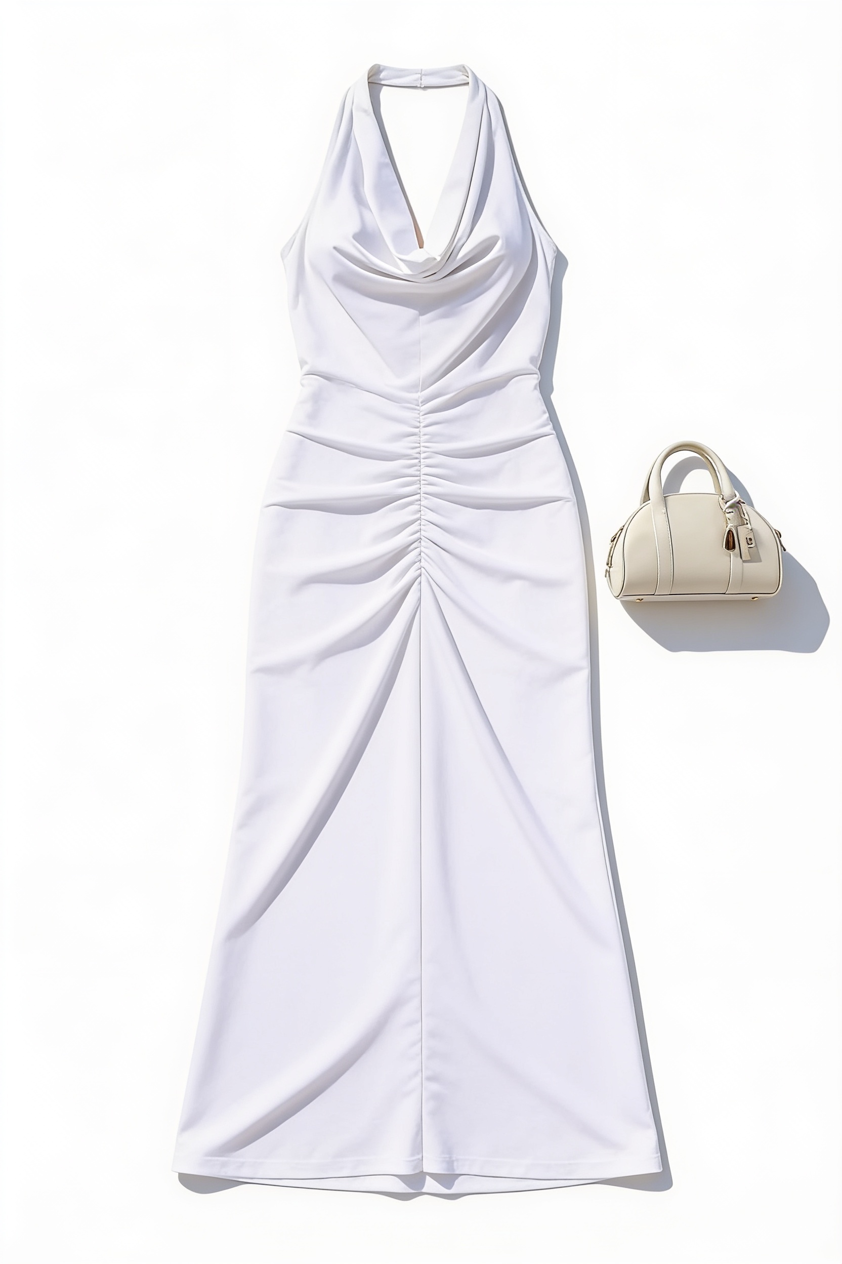White draped maxi dress and top-handle bag