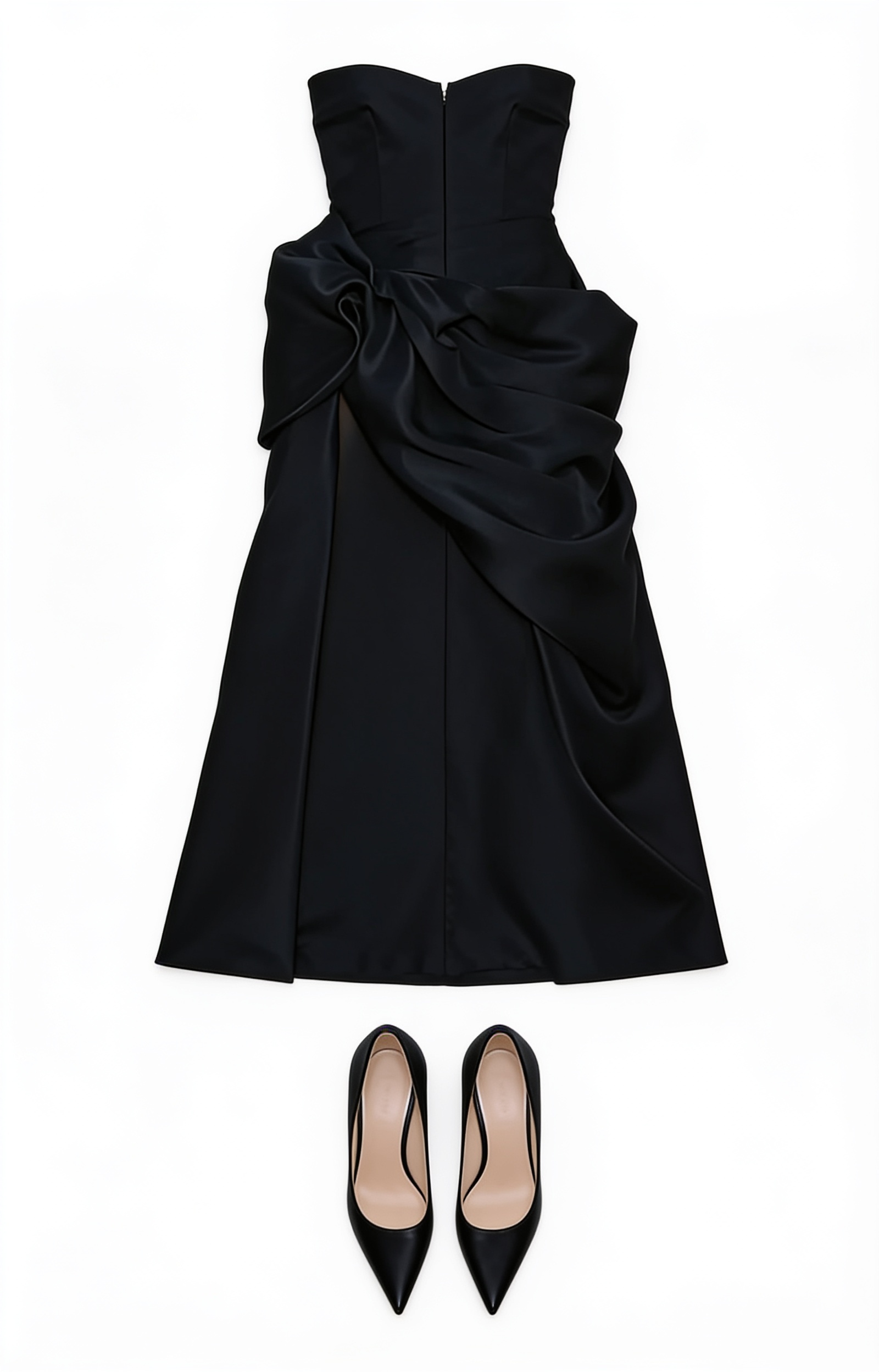 Black strapless slit gown and pointed pumps