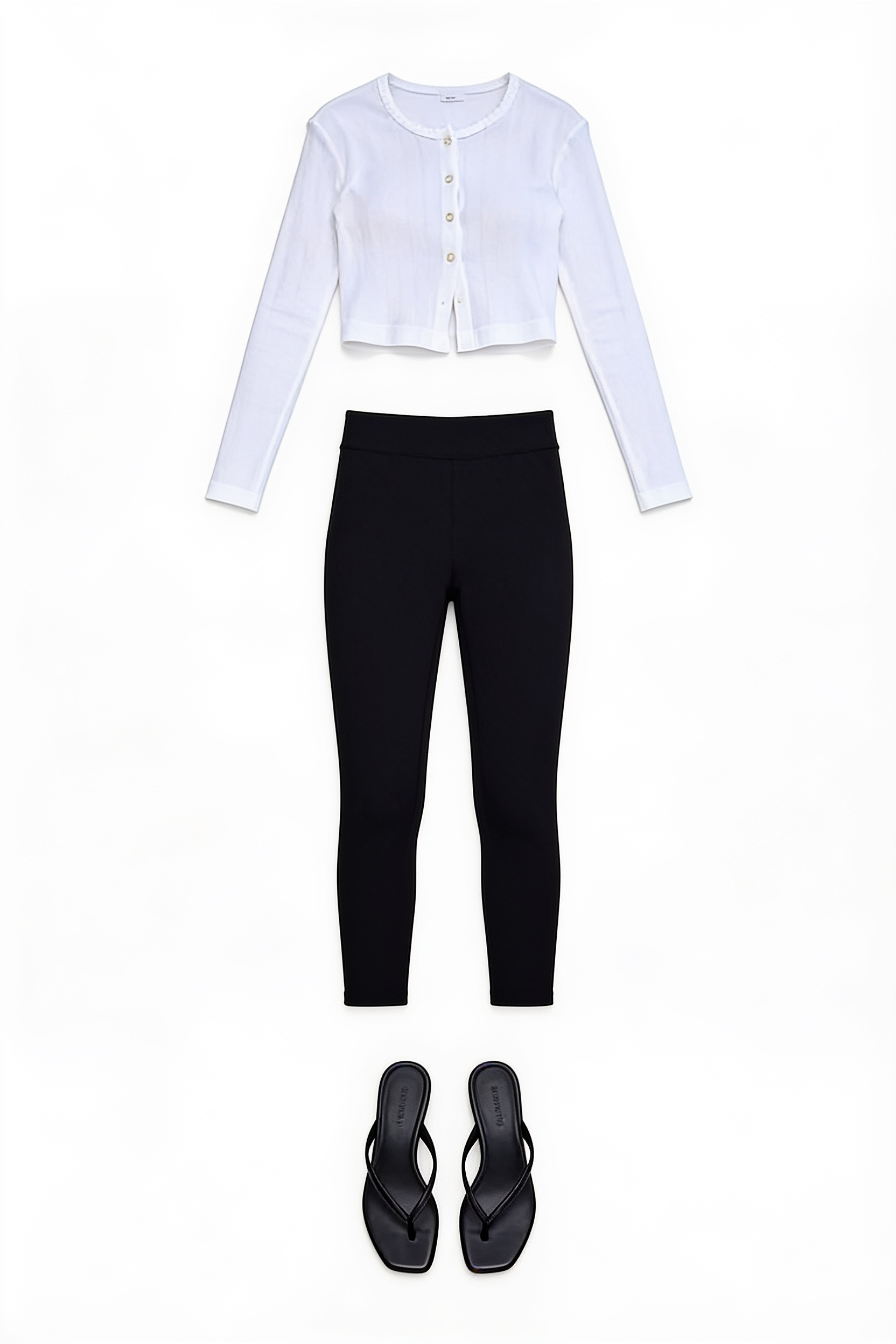 White buttoned shirt and black capri trousers