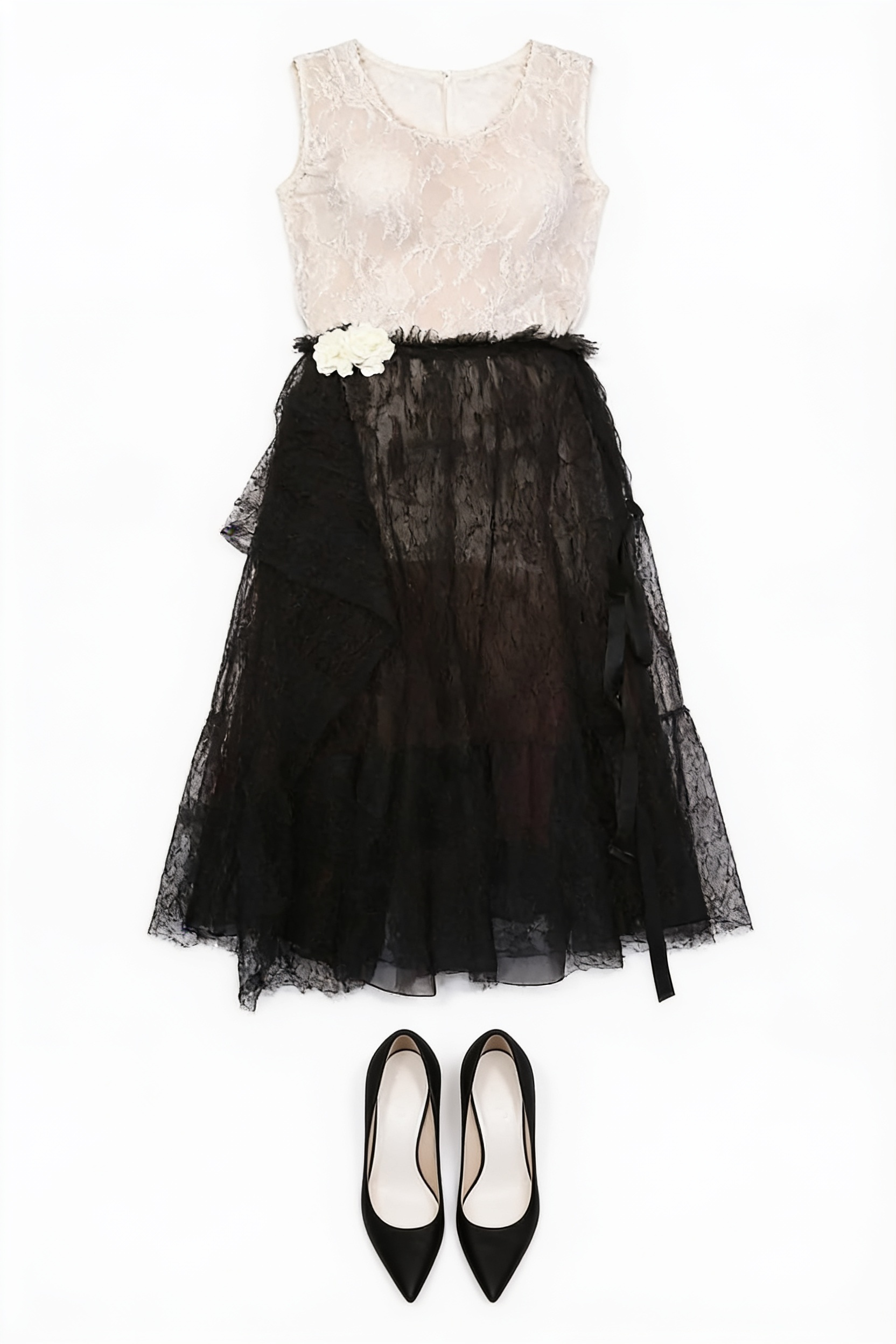 White sleeveless top and black lace skirt